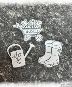 The back of wheelbarrow, welly boots & watering can to show the engraving